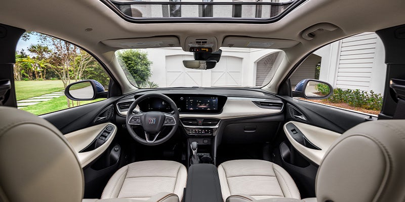Driver's seat of the 2025 Buick Encore GX featuring advanced controls and touchscreen